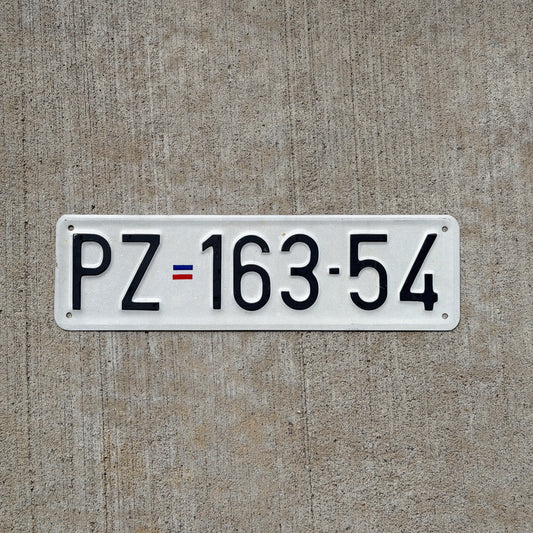 Photo of a Serbia License Plate Auto Tag Garage Decor Vintage PZ 163 54 with original patina