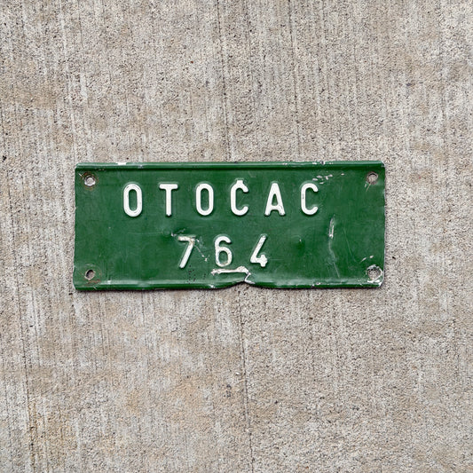Photo of a Serbia Tractor License Plate Auto Tag Garage Decor Vintage 764 with original patina