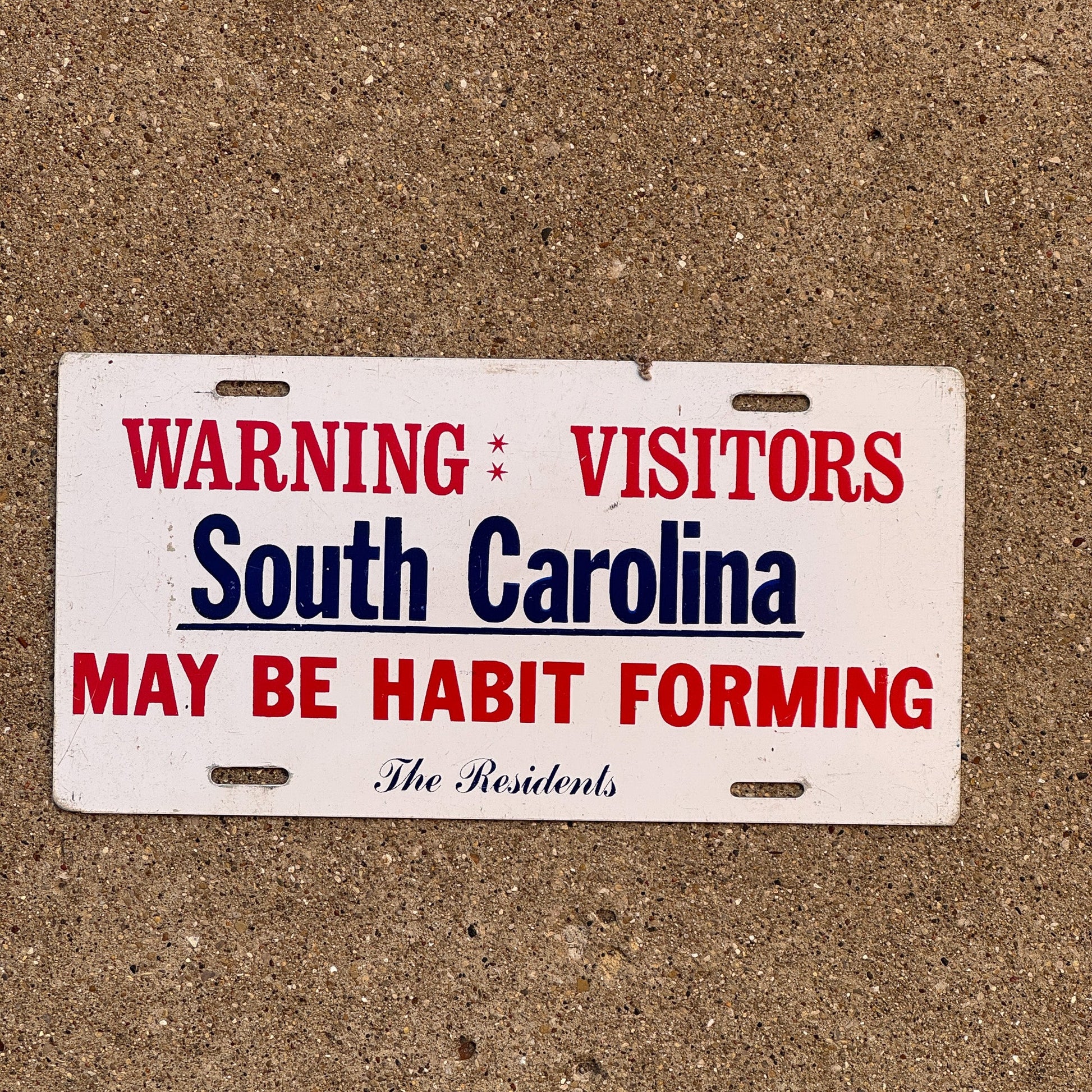 Photo of a South Carolina Booster License Plate Auto Tag Garage Decor Vintage Metal May Be Habit Forming