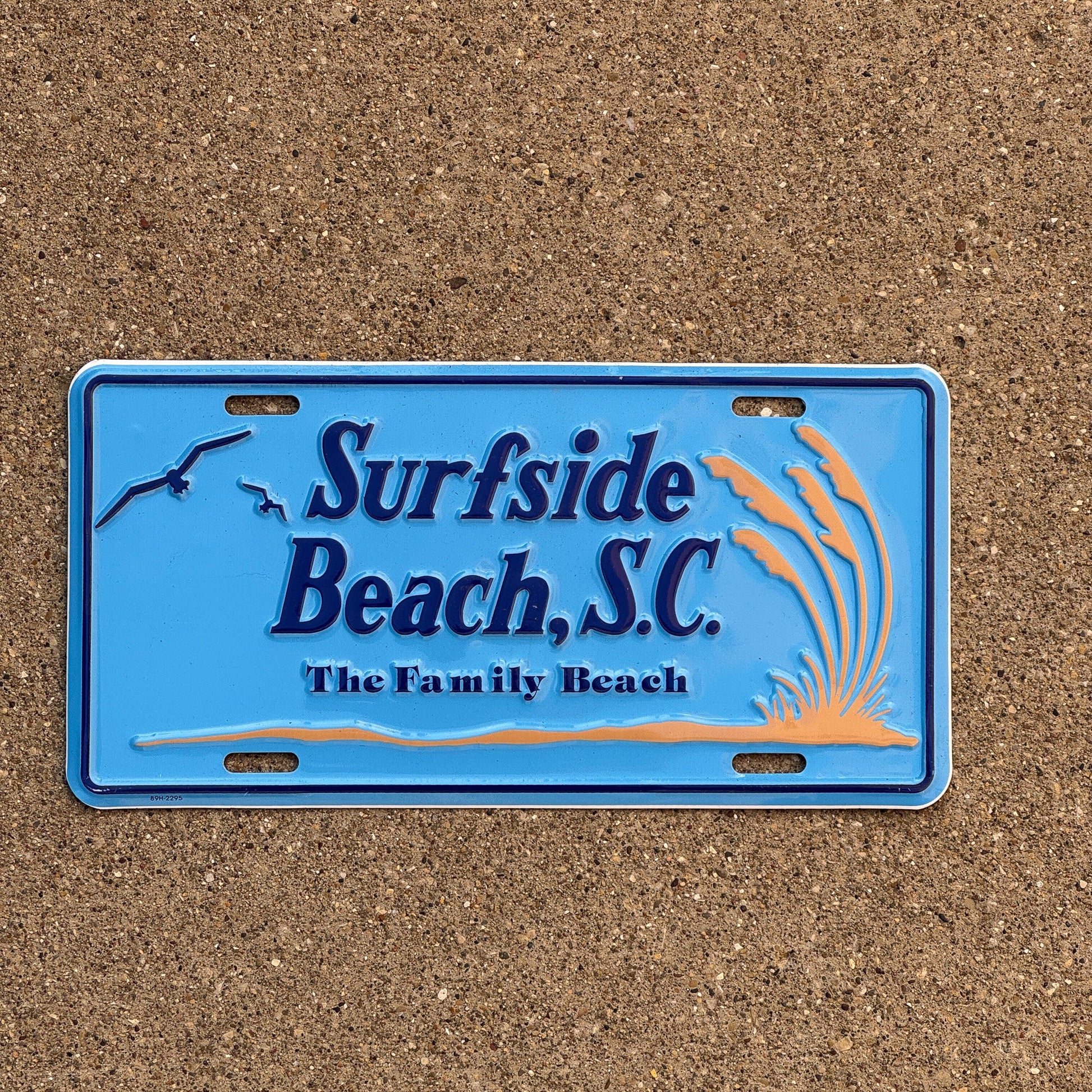 Photo of a South Carolina Booster License Plate Auto Tag Garage Decor Vintage Metal Surfside Beach