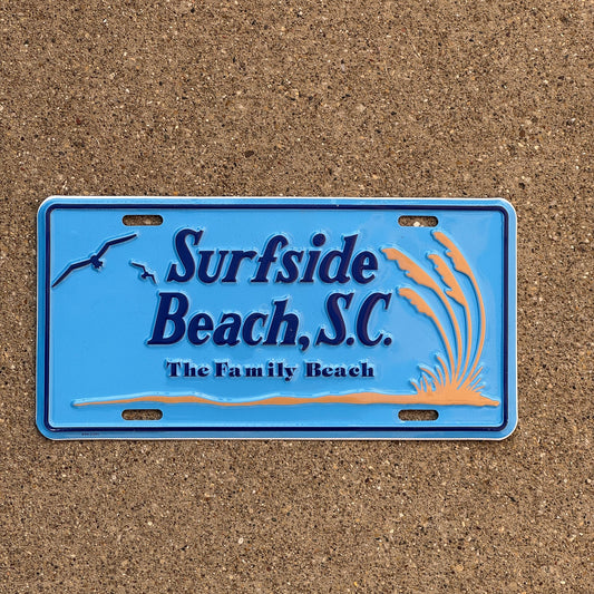 Photo of a South Carolina Booster License Plate Auto Tag Garage Decor Vintage Metal Surfside Beach