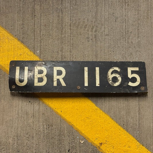 Photo of a Uganda License Plate Auto Tag Garage Decor Vintage UBR 1165 with original patina